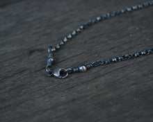 Man in Moonstone Feather Balance Necklace